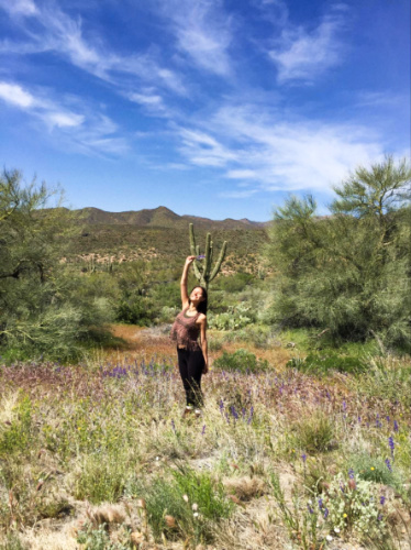 The author McKenna Mobley, posing in saguaro