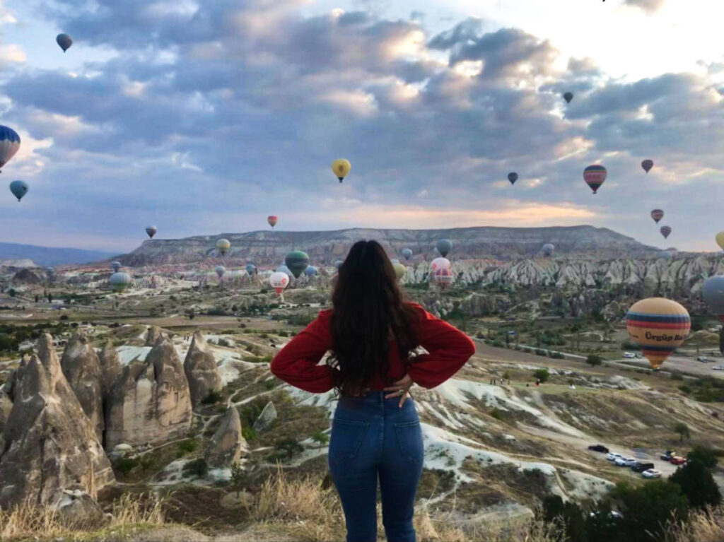 The author Mckenna Mobley, enjoying the hot air balloon views at sunrise