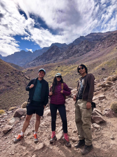 The author McKenna Mobley with her friends, posing for a photo in Toubkal
