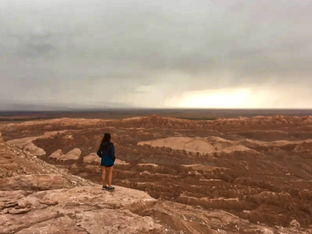 The author Mckenna Mobley, admiring the view of Atacama Desert