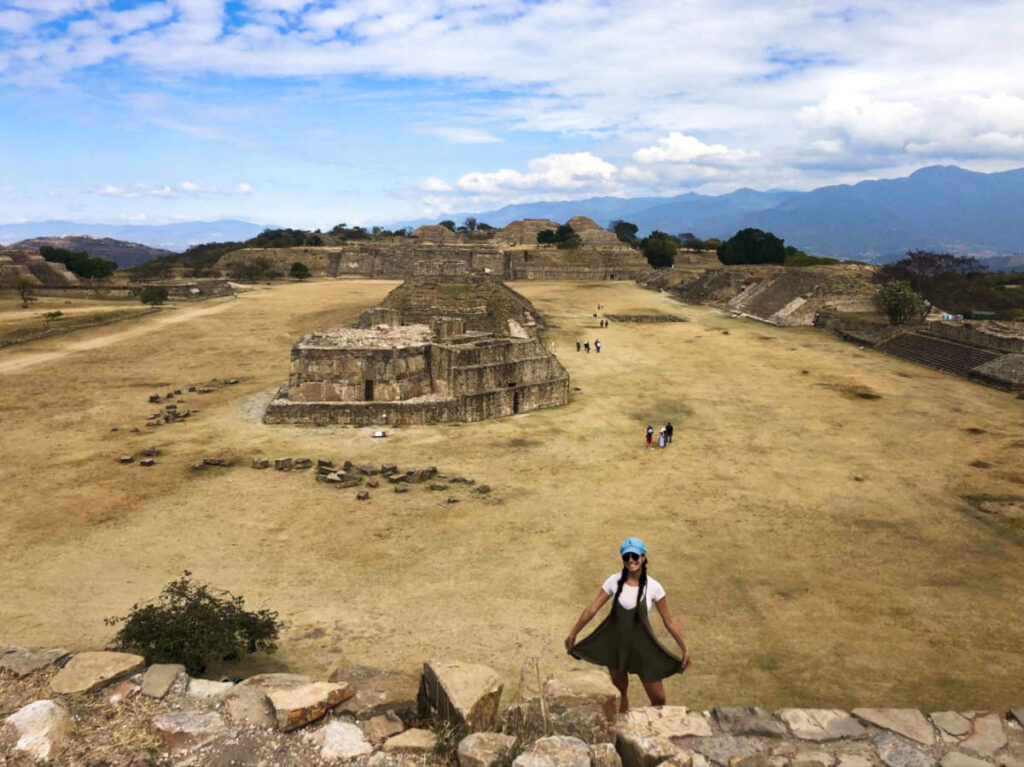 The author Mckenna Mobley, posing in front of Monte Alban