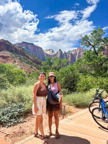 The author McKenna Mobley with a friend, posing for a photo at the Pa’rus Trail in Zion National Park