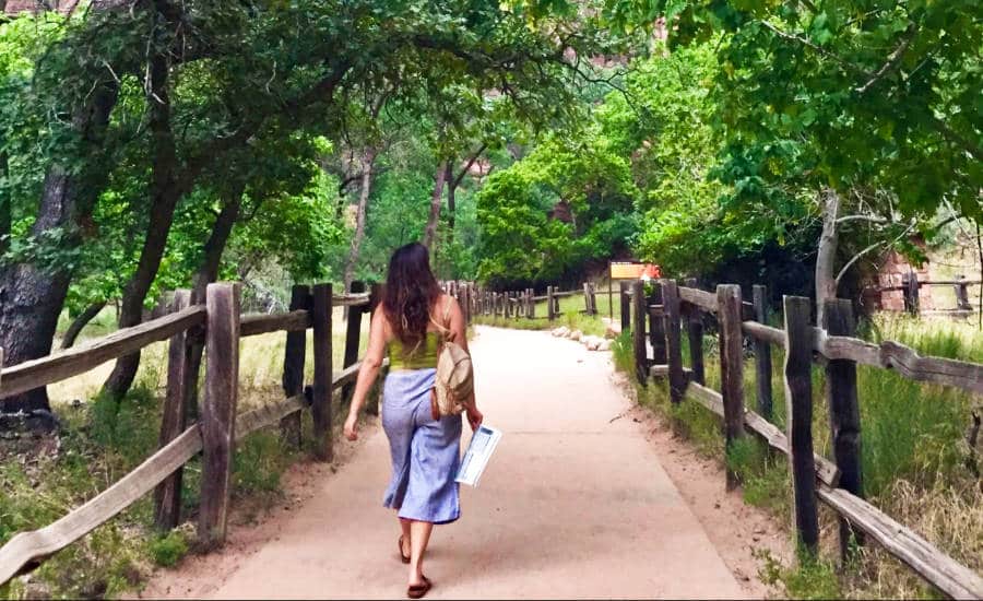 The author McKenna Mobley strolling through Zion National Park