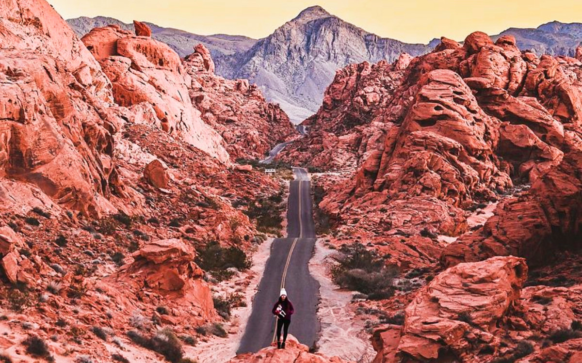 Travel Lemming Writer, McKenna standing on a rock at the Valley of Fire State Park