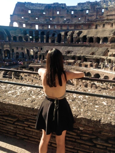 The author McKenna Mobley, looking at the Roman Colosseum