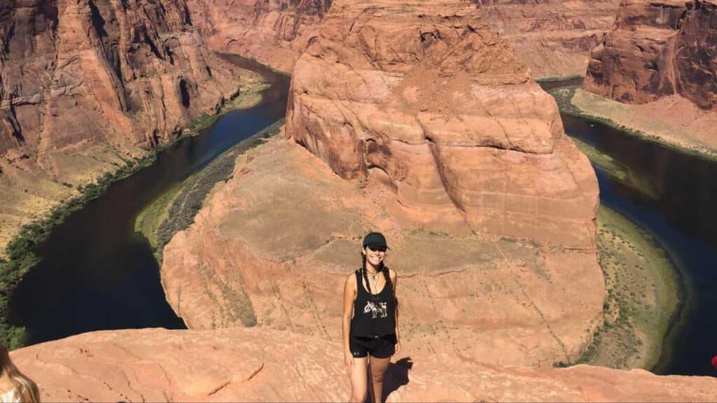 The author with a scenic view on her background in Glen Canyon National Recreation Area