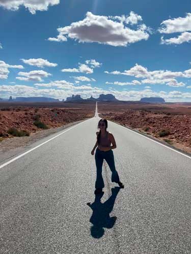 The author with the Monument Valley towers on her background