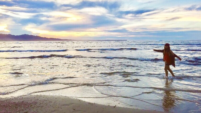 The author McKenna Mobley, enjoying the beach in Puerto Viejo at sunset