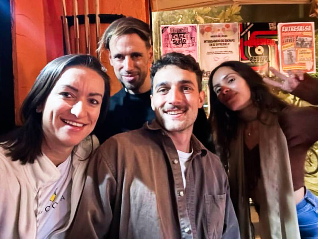 The author Mckenna Mobley, posing for a photo with her friends at the hostel