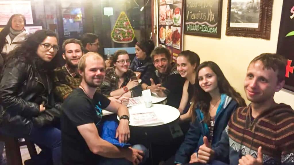 The author McKenna Mobley with a group of people at a hostel
