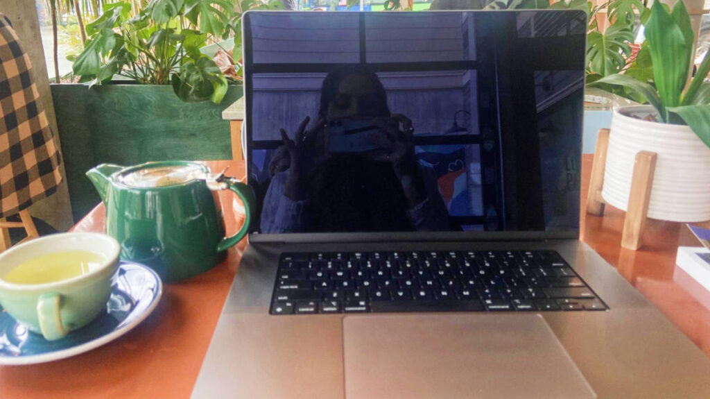 The author, McKenna Mobley taking a photo from the laptop's monitor