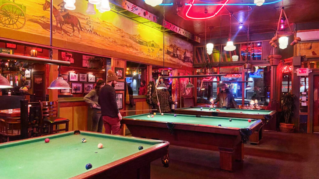 View of people and pool tables at the McMenamins Tavern & Pool