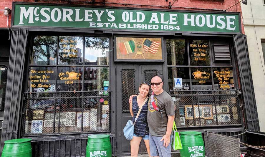 Travel Lemming writer Laura with her husband in front of the McSorley’s Old Ale House