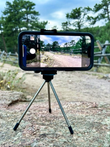 A mobile phone shooting on  a mini tripod of MeFOTO Roadtrip PRO