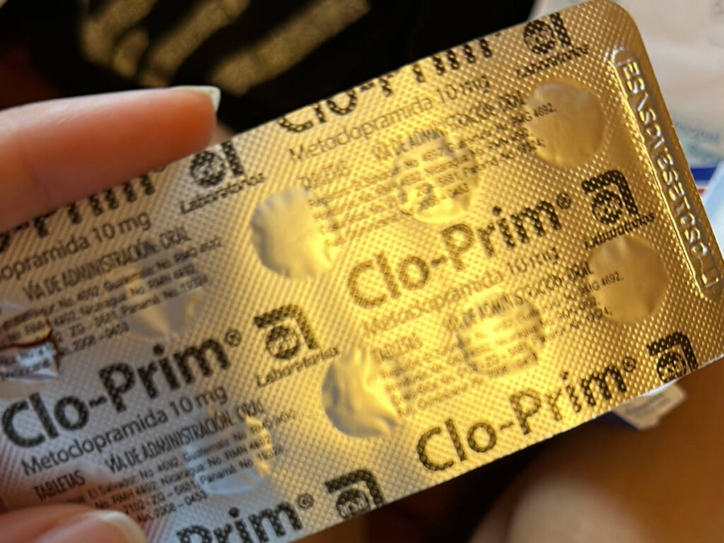 A hand holding medicines