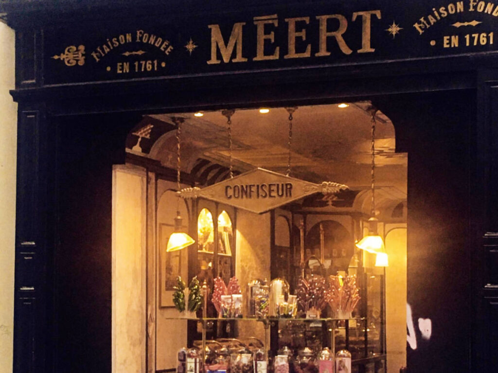 View of the displayed products from the glass window of Meert in Paris