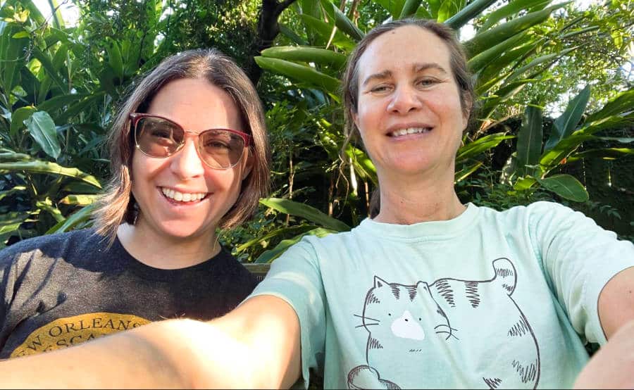 The author Meg O'Connor with her friend taking a picture together