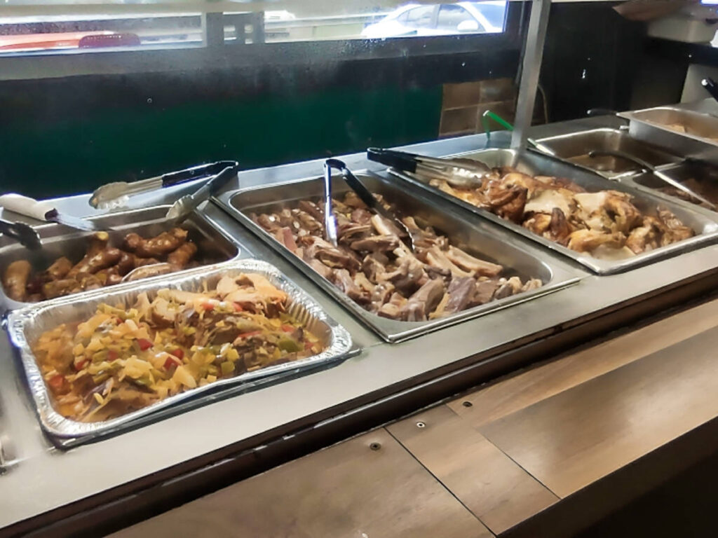 View of the counter with the menu in Lechonera