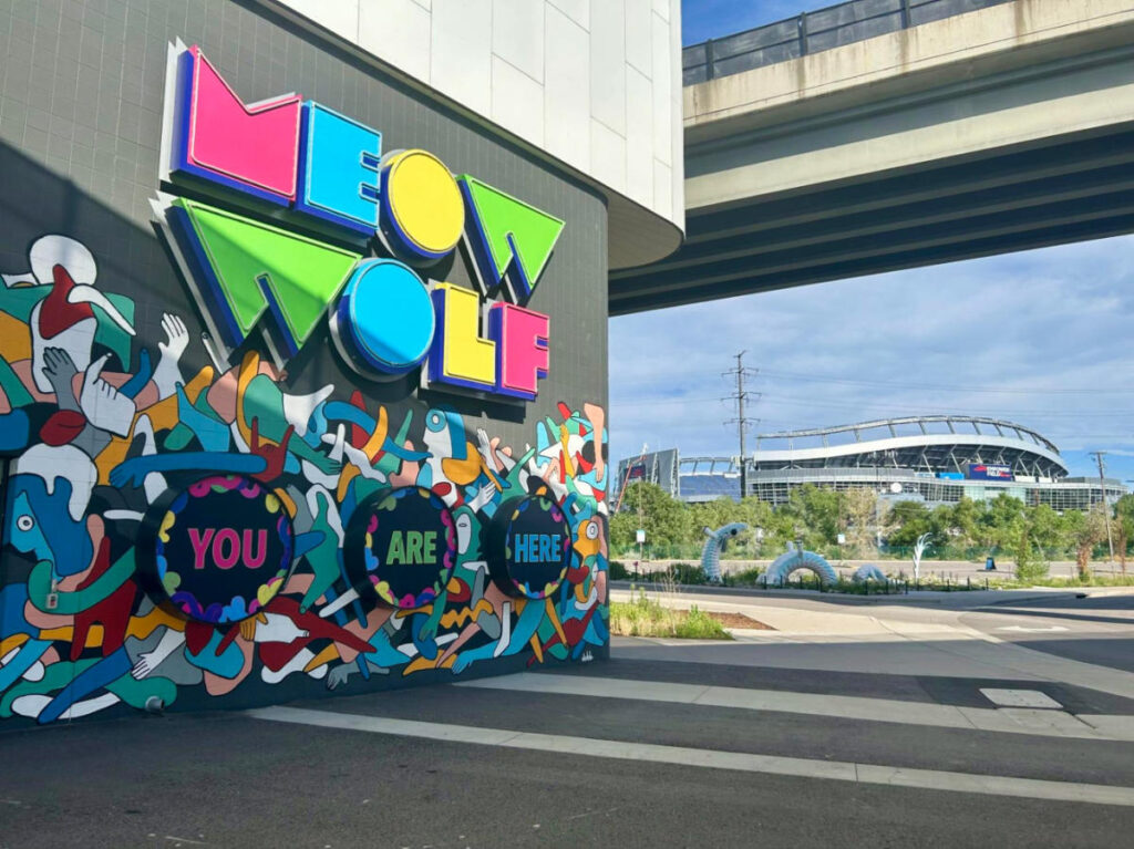 Artsy You Are Here Sign at Meow Wolf Denver