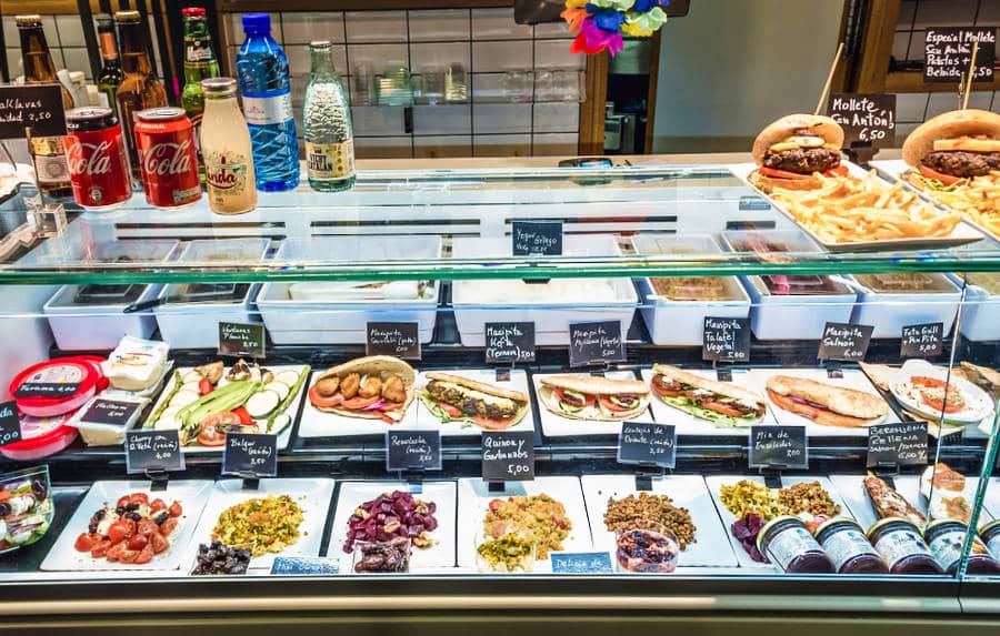 View of the displayed lunch items in San Anton indoor market in Madrid