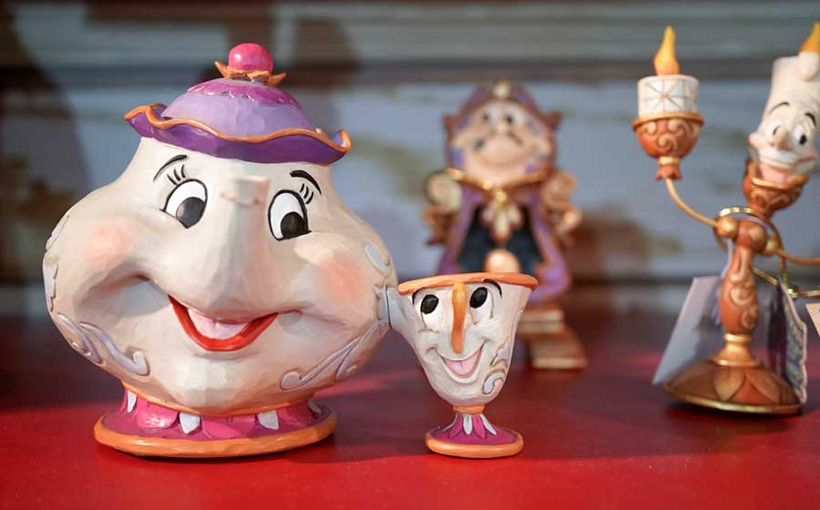 Beauty and the Beast characters merchandise displayed on a store