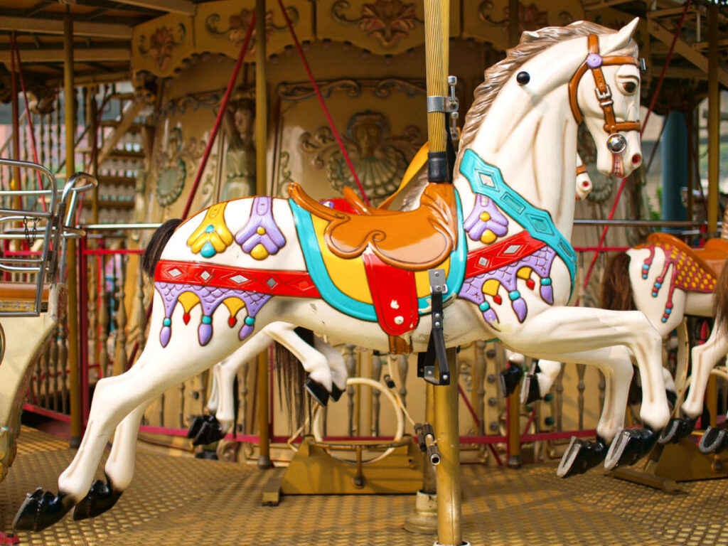 Closeup view of a colorful horse sculpture on a Merry Go Round