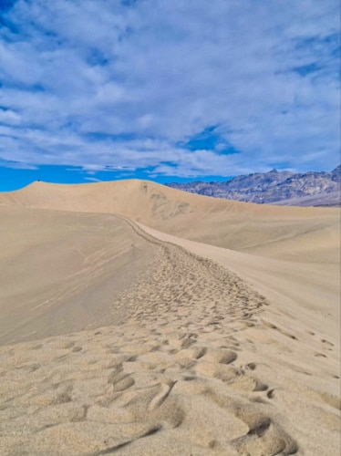 View of the Mesquite Flat Sand Dunes and the blue sky in the background