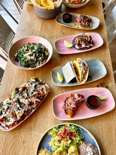 A table full of a variety of Mexican foods at Lady Nomada