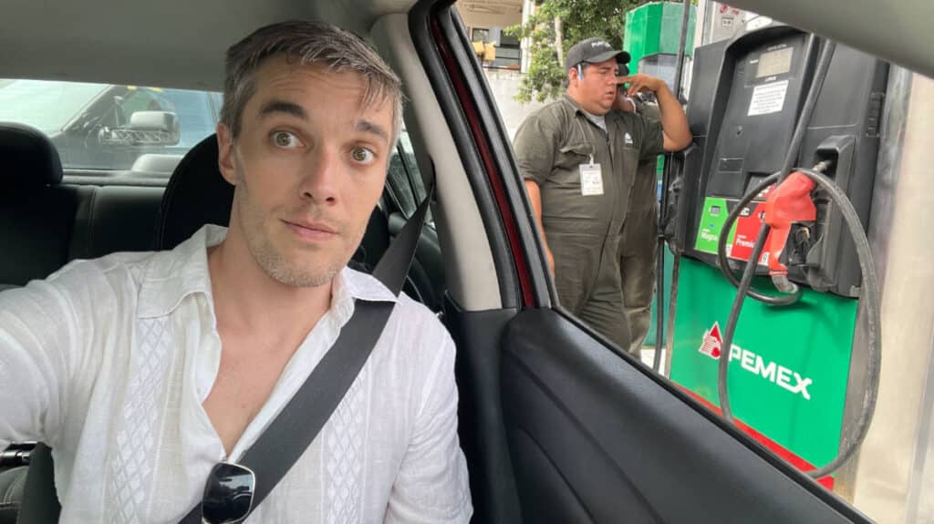 The author, Nate Hake waiting for service a Mexican gas station