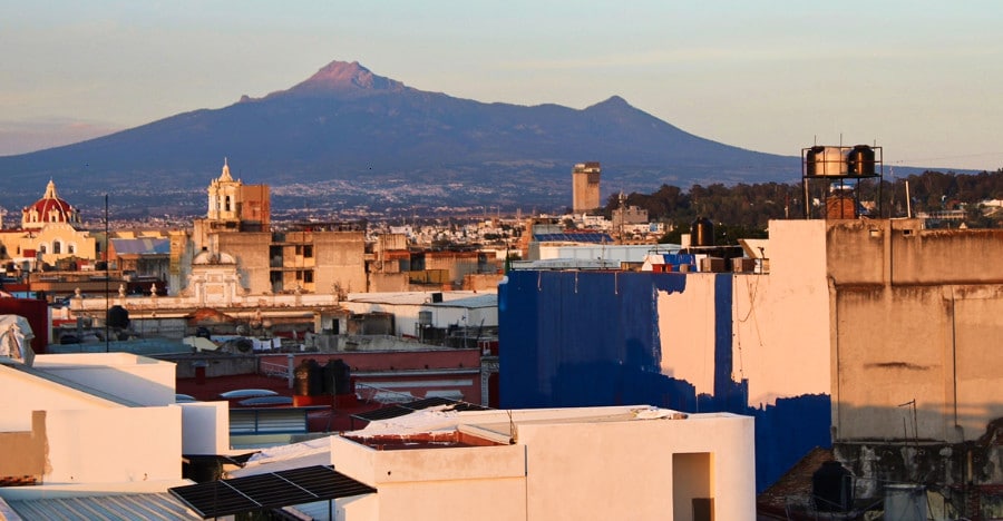 Sunset aerial view of the mountains and downtown Mexico