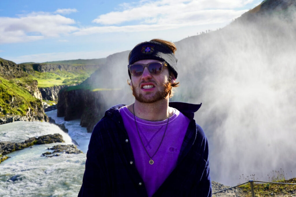 Michael getting soaked with spray at Gulfoss Falls