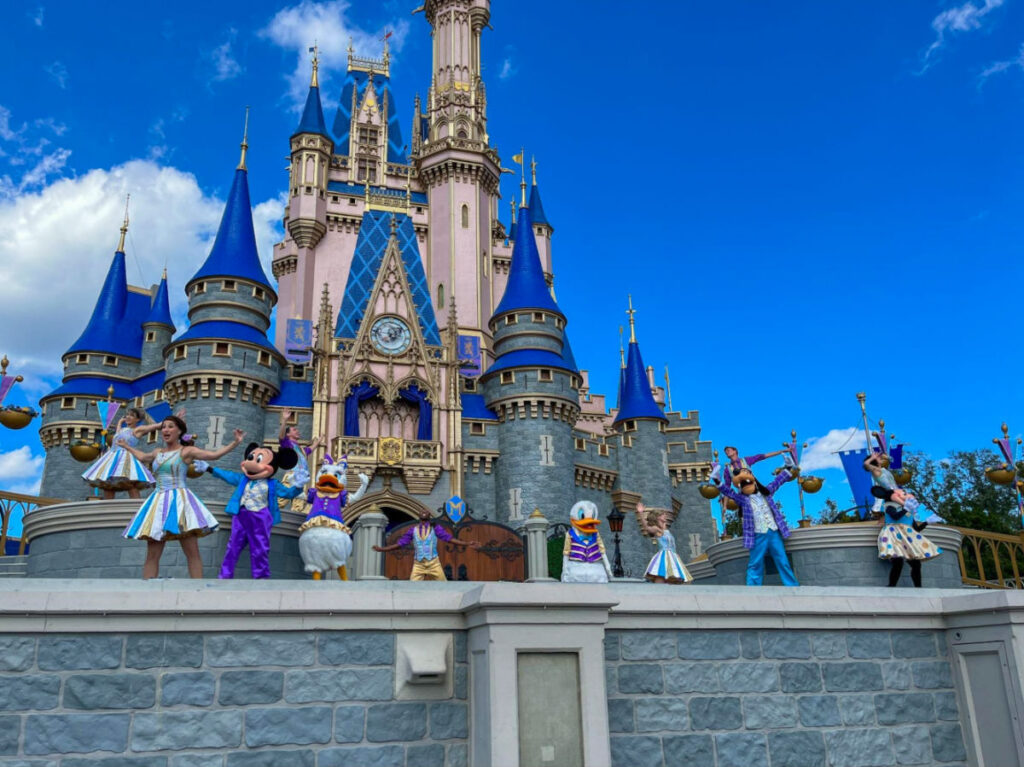 Mickey Mouse and friends performing on stage at Disney