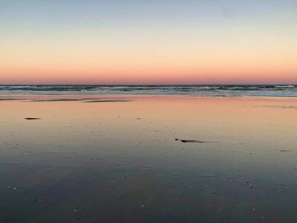 Scenic view of the sunset over the calm waters of Mickler’s Landing
