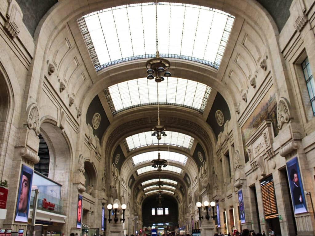 View of the intricate interior and ceiling of Milan Central Train Station