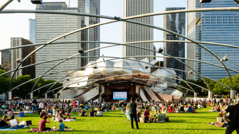 People having a picnic at Millennium Park Summer Music Series at Jay Pritzker Pavilion