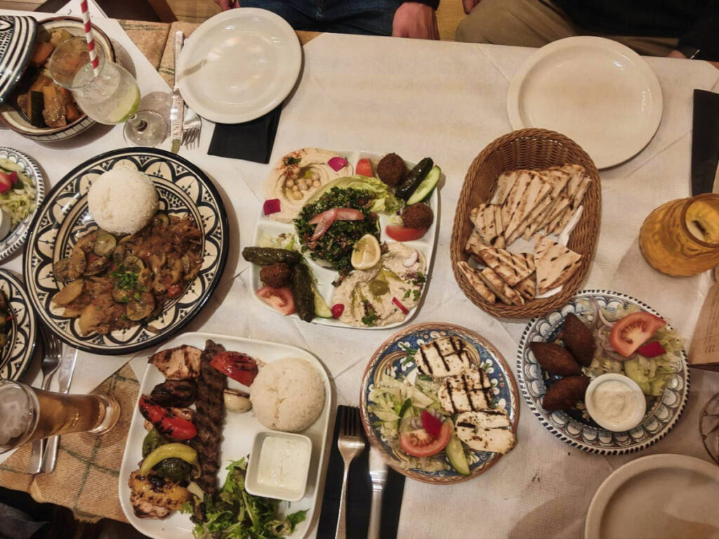 Top view of the variety foods on the table at Mina Restaurant