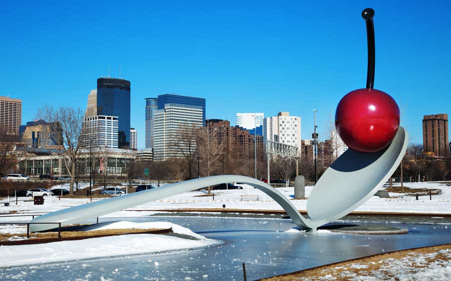 View of a Spoonbridge and a cherry sculpture in Minneapolis Sculpture Garden