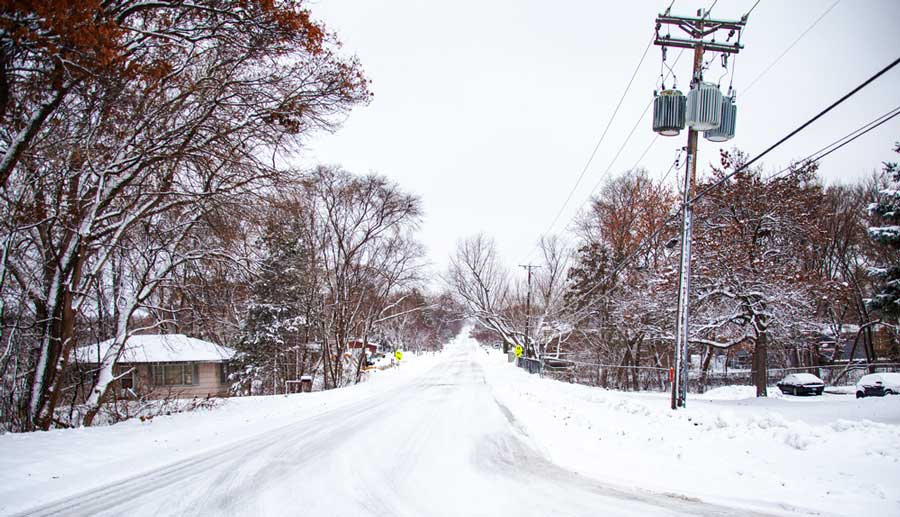 View of the snow covered street in Minneapolis during winter season