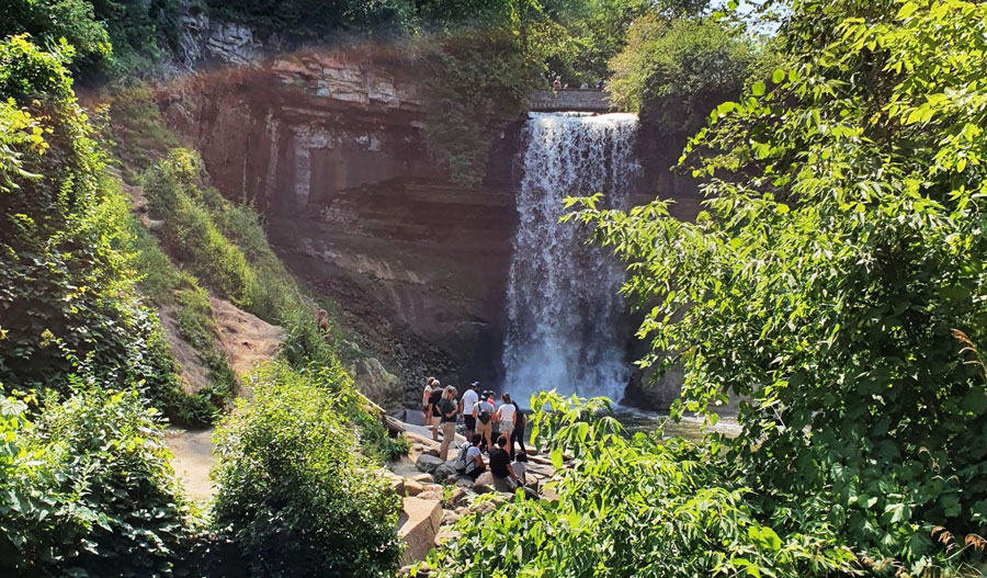 View of people admiring the Minnehaha Falls in Minneapolis