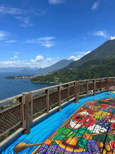 A colorful painted deck and the view at Mirador Kaqasiiwaan