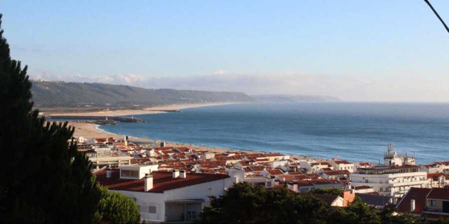 A picturesque aerial view of the coastal town of Nazare