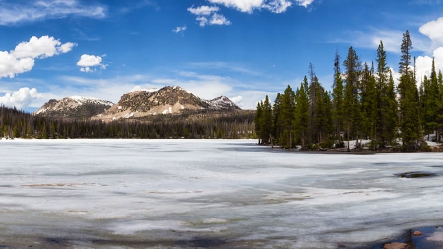 View of the Mirror Lake surrounded by mountains and trees