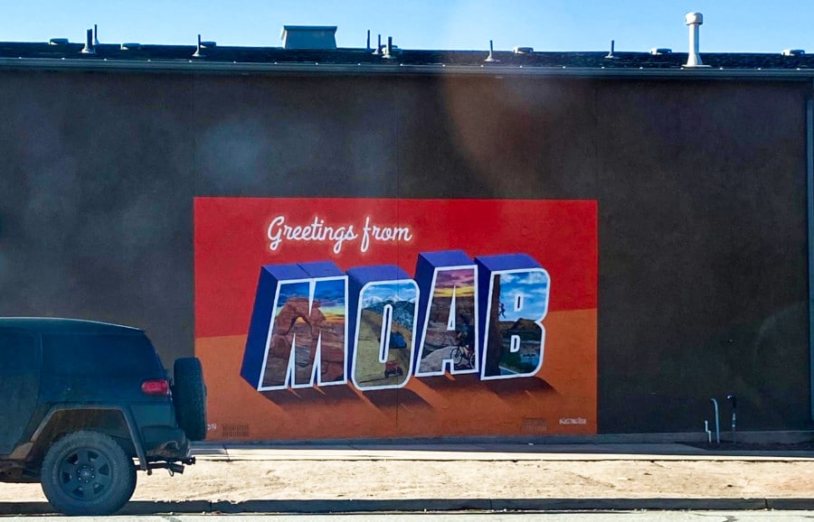 Painted greetings from Moab on a cemented wall