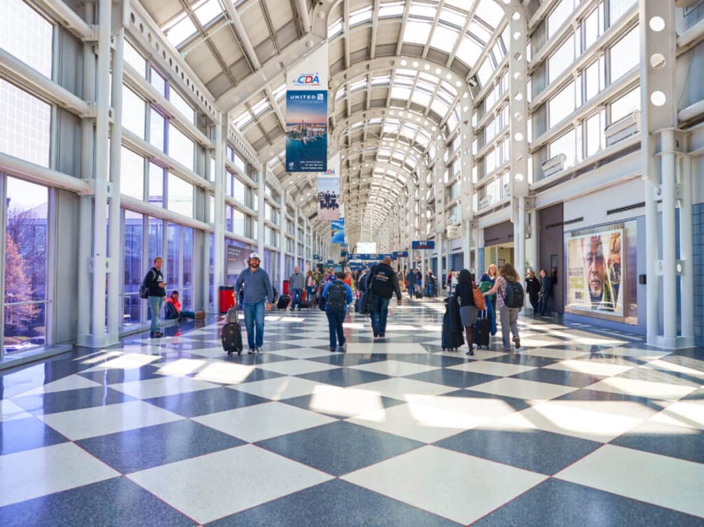 View of the people walking at the modern interior of Chicago O'Hare Airport