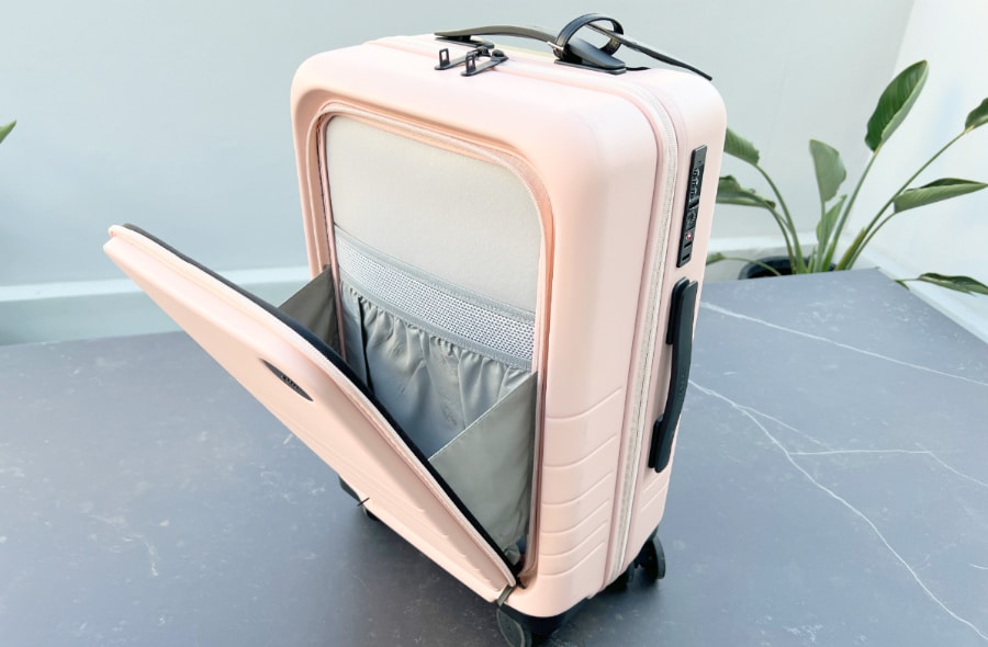 The Pop-out laptop compartment of Rose Quartz Monos Carry-On Pro