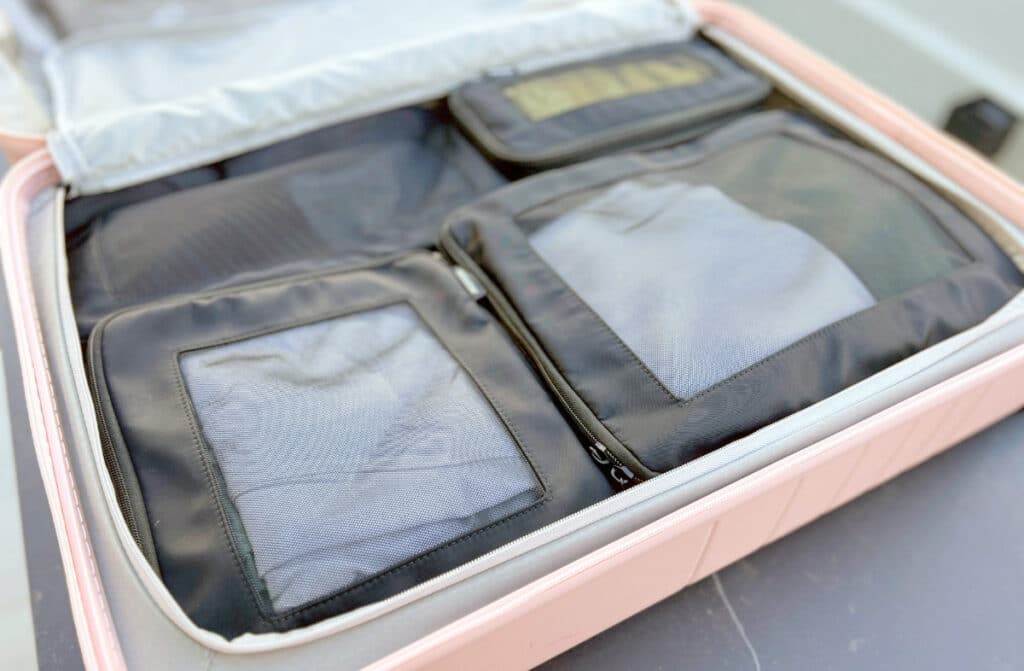 Monos Compressible Packing Cubes inside a Monos luggage