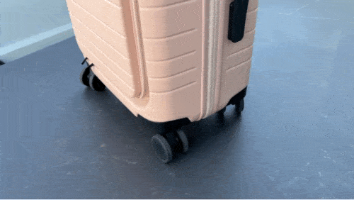 The Monos luggage spinning 360 with its spinner wheels