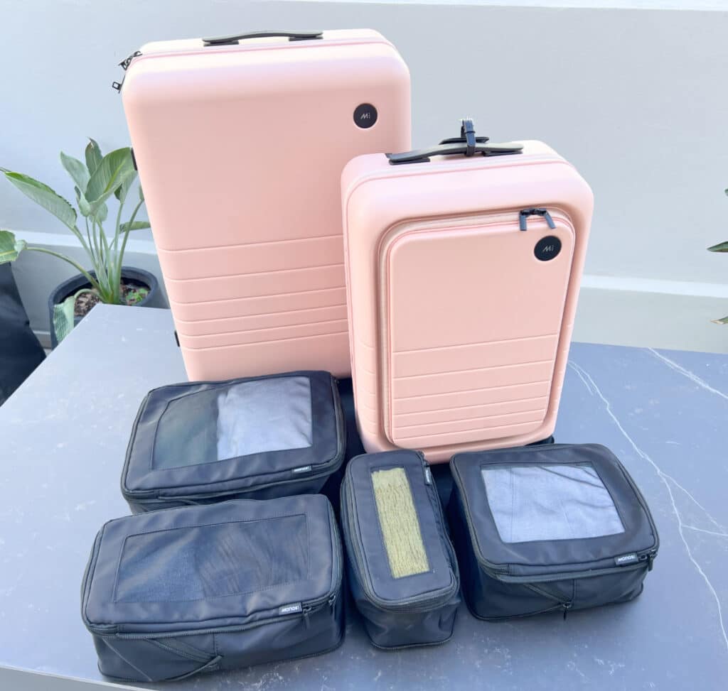 The Monos Luggage with the Monos compressible packing cubes