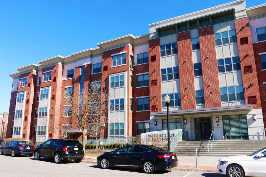 View of the Montclair Residences and the cars parked in front of it