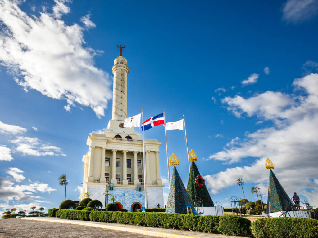 View of the flags in front of the Monument of Santiago de los Caballeros